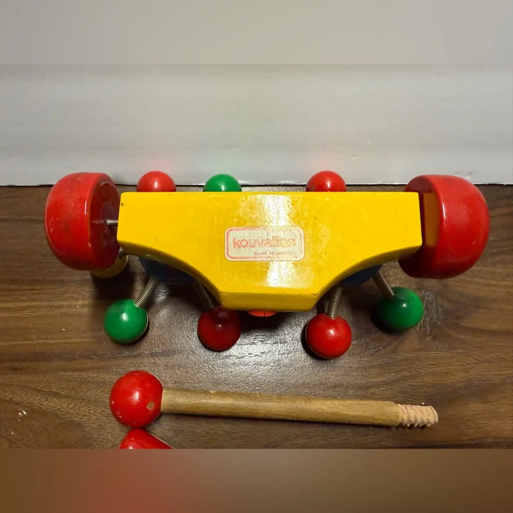Very Rare vintage Kouvalias Vibrant Wooden Toy with Red, Yellow, Green, and Blue